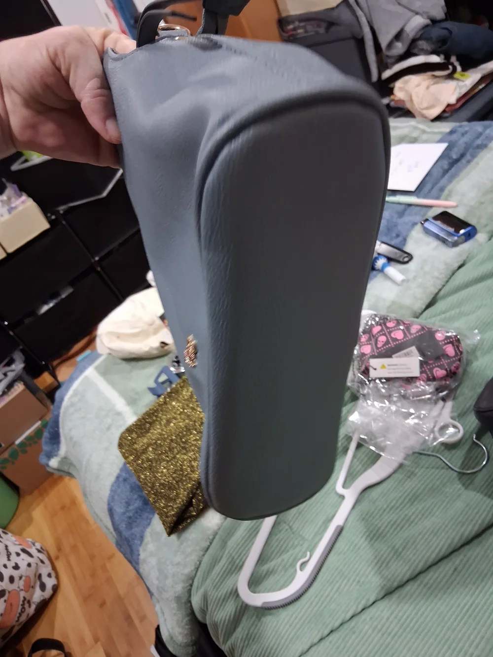 Small Pebbled Light Gray Crossbody Bag with Gold Accent